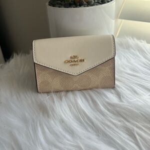 Coach flap card case